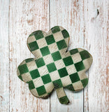 Wooden checkered shamrock riser