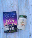 All the missing pieces by Catherine Cowles- smoky orange scented soy candle
